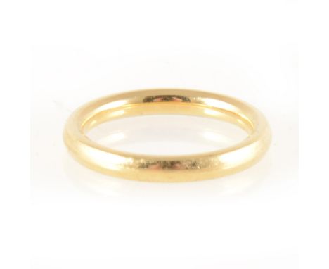 An 18 carat yellow gold wedding band, 2.5mm wide D shape, plain polished finish, hallmarked Sheffield, approximate weight 4gm