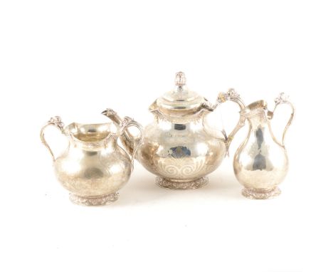 A Victorian three piece silver teaset, Smith, Nicholson &amp; Co (Stephen Smith &amp; William Nicholson), London 1858, compri