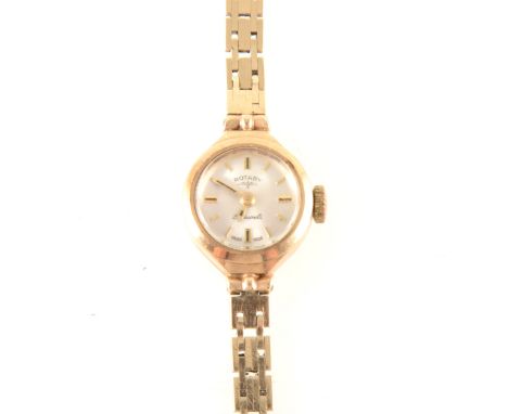 Rotary - a lady's 9 carat yellow gold bracelet watch, circular silvered baton dial in a 9 carat yellow gold 14mm tonneau shap