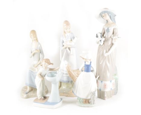 Ten assorted Spanish porcelain figures, including Lladro and Nao. (Qty: 10)