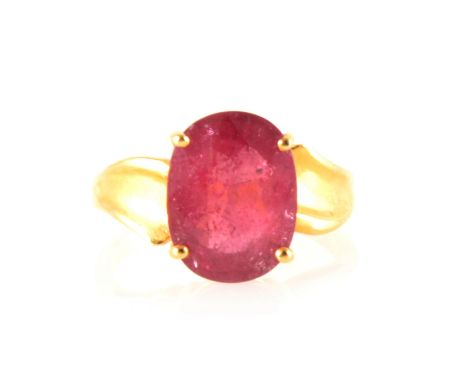 A ruby dress ring, an oval mixed cut ruby 12.7mm x 9.7mm, approximate weight 6.6 carats, four claw set in an 18 carat all yel