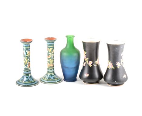 A quantity of ceramic candlesticks and vases, one box.