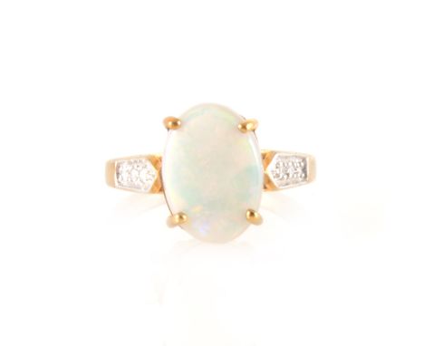 An opal doublet dress ring, the oval cabochon cut opal doublet 13mm x 10mm, four claw set in a 9 carat yellow gold mount with
