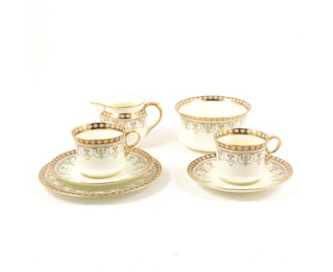 A Cauldon tea service with blue and gilt border and Royal Worcester plates in the "Padua" pattern, Carlton Ware preserve pot,