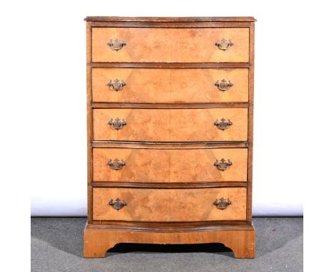 A reproduction figured walnut bowfront chest of drawers, fitted with five long drawers, bracket feet, width 63cm.