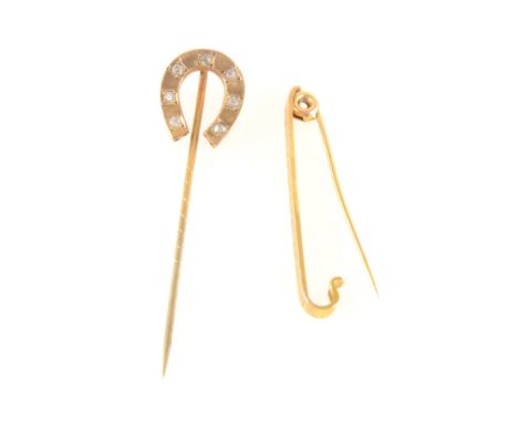 A horseshoe pin and bar brooch, the horseshoe pin marked 9c and set with seven synthetic white stones, a 35mm long bright cut