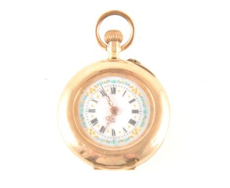 A small open face fob watch, the white enamel dial having a roman numeral chapter ring and turquoise and gilt floral border i