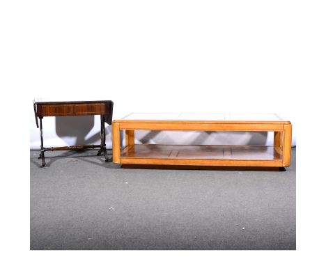 A contemporary stained wood coffee table, three-panel glass top, parquetry work under-tier, 142cm x 65cm; and a mahogany drop