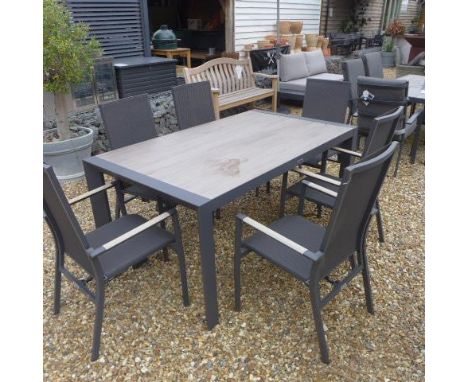 A Kettler garden table and six chairs model Surf Active ex display - RRP £1,549 