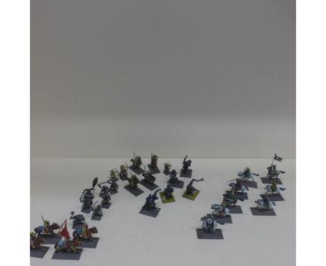 A collection of 136 Lord of the Rings/Fantasy/Wargaming metal/plastic figures - 55 Mordor Uruk-hai, 30 Woodmen, 15 Harad Cava