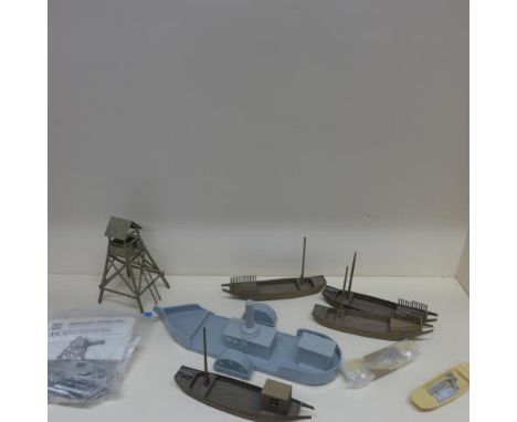 Four balsa card Chinese boats, 9" x 2" approx - two resin Chinese boats, 6" x 1 3/4" approx - one balsa watch tower with ladd
