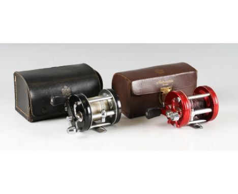 2x Abu Ambassadeur multiplying reels: Ambassadeur 6000 with reds end plates, foot stamped 010600 - in makers brown leather ca