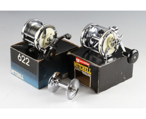 2x Mitchell Salt Water Reels in makers boxes: fine Mitchell 624 stainless steel frame, white end plates, counterbalance handl