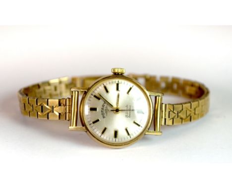 A ladies 9ct gold Rotary wristwatch with 9ct gold strap and spare links.