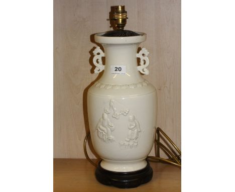 A 19th century Chinese Blanc De Chine porcelain vase mounted as a table lamp, H. 43cm.