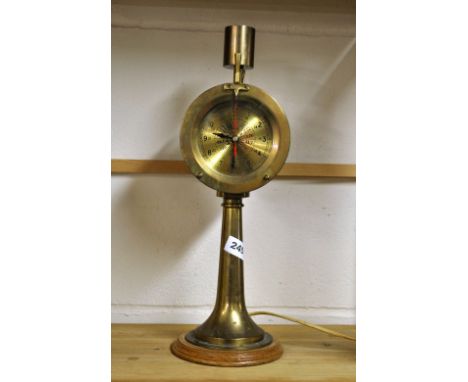 A vintage brass ships style clock table lamp, H. 43cm.