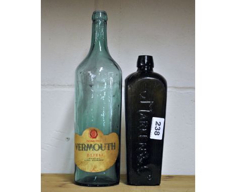 An early V. Marken & Co, Dutch gin bottle and a further vintage bottle.