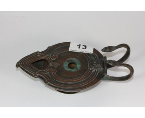 A 19th century copper oil lamp in an ancient Egyptian style, patent stamp to base, W. 18cm.