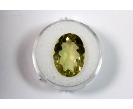 A large oval cut light yellow citrine, approx 11ct.