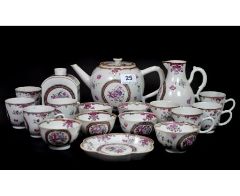 A rare 18th century Chinese (Qianlong Period) porcelain tea set comprising a teapot, tea caddy, milk jug, dish, 6 tea bowls a