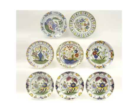 eight quite big round and antique dishes in marked ceramic from delft with a polychrome decor these plates represent the last