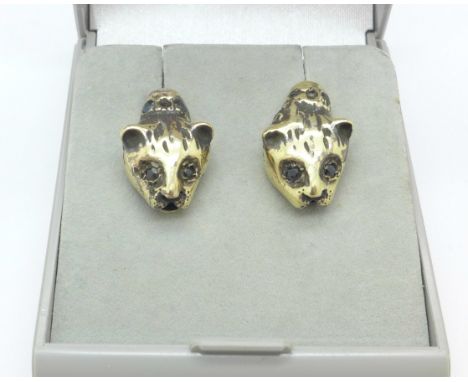 A pair of 9ct gold cat earrings set with sapphire eyes, 6.4g, (one hallmarked, made from a bangle)