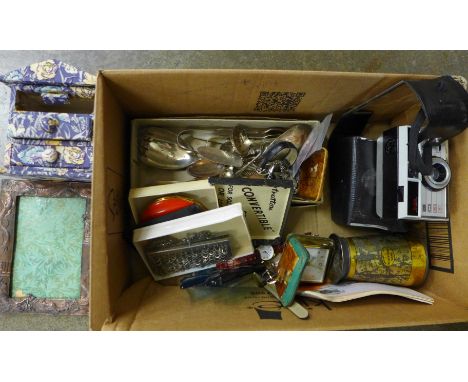 A Chinese photograph frame, flatware, Kodak Instamatic camera, etc.