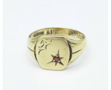 A 9ct gold and garnet signet ring, 4.3g, R