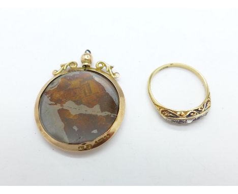 A 9ct gold photograph locket and an 18ct gold ring set with old cut diamonds and ruby, ring 1.9g, L