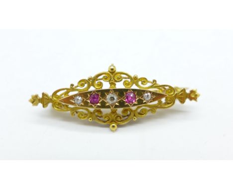 A 15ct gold, diamond and ruby brooch, 5.6g