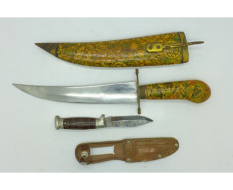 Two knives, one marked Sheffield, the other with decorative handle and scabbard