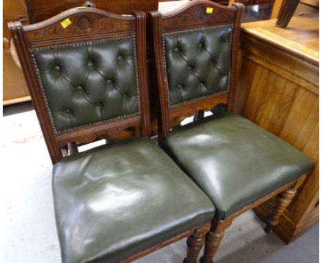 A pair of button leather drawing room chairs
