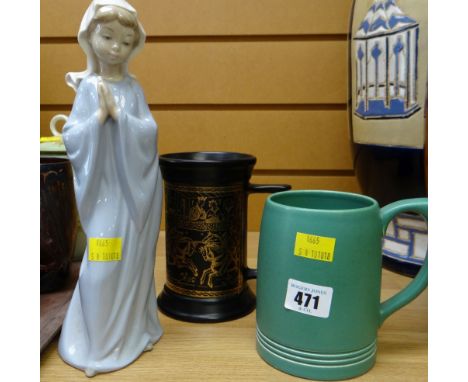 A green Wedgwood pottery mug together with a Sylvac mug & a Nao figure of a praying maiden