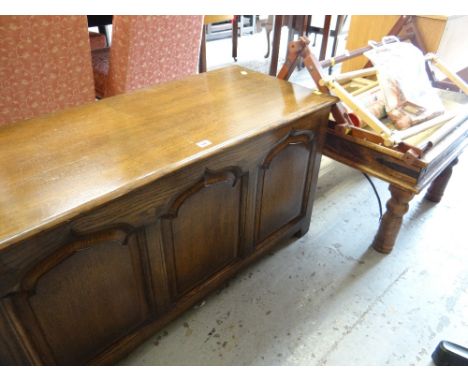 A good reproduction oak blanket box, modern glass top coffee table, a parcel of tapestry equipment