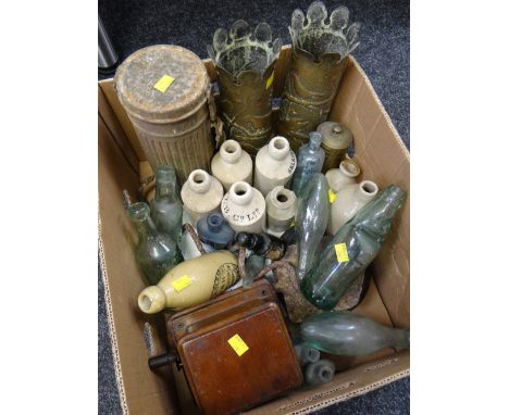 A selection of vintage stoneware & glass bottles etc together with a pair of decorated artillery shells