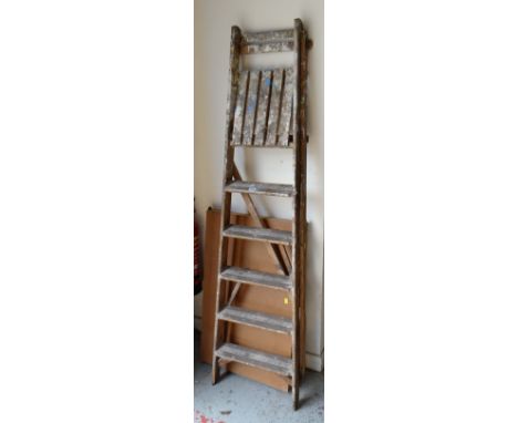 A vintage wooden stepladder & folding pasting table