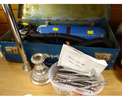 A cased vintage miniature vacuum cleaner together with a parcel of dentist's tools