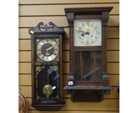 A vintage Vienna-style oak cased wall clock together with a modern wall clock