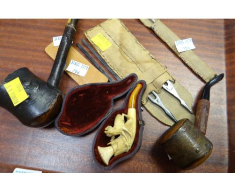 Cased miniature Meerschaum pipe, two other pipes, collection of tuning forks