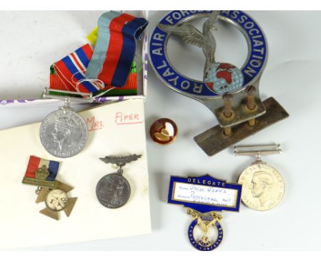 A vintage Royal Air Forces Association car grill badge, two WWII medals etc