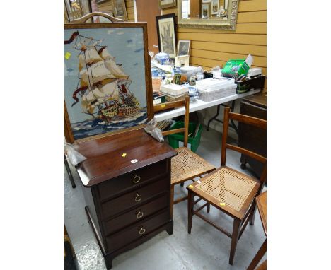 A Stag Minstrel four-drawer chest, pair of occasional chairs & a tapestry fire screen