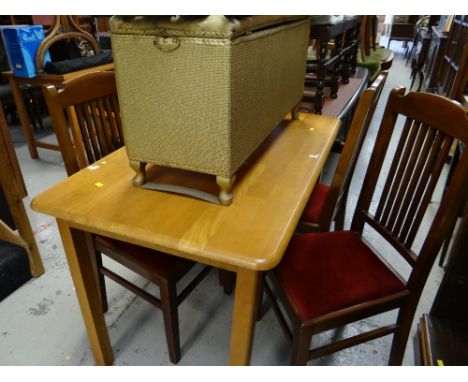 A vintage Lloyd Loom serpentine linen basket, an antique carved chair & a modern table & four chairs