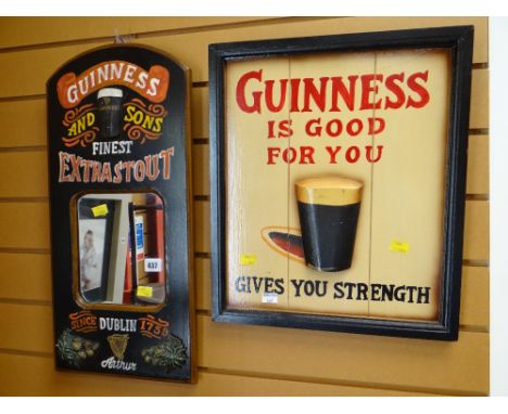 A small modern novelty mirror with Guinness Extra Stout together with a small modern wooden sign 'Guinness is Good For You'