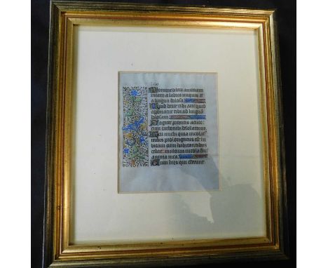 Manuscript vellum leaf from a Book of Hours, mid-15th century, written in dark brown ink with initials in blue, red and gold 