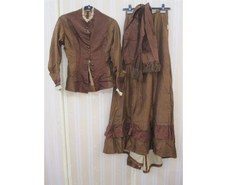 Victorian walking outfit comprising fitted top and skirt, buttoned front, fitted waist,, a sash ,had some alteration possibly
