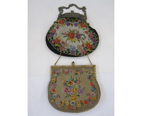 Silver-coloured metal frame, pierced and chased with images of cherubs, etc on a tapestry bag and a petit point evening bag w