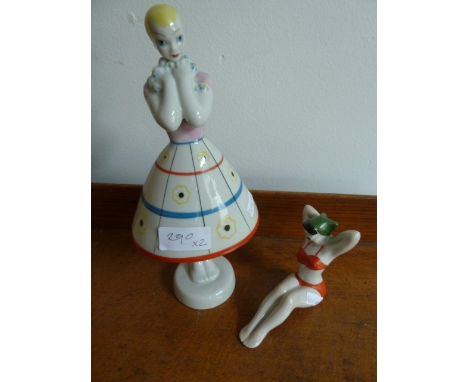 Ceramic figure of a girl, 1950's style , marked to base Ukraine, 23 cms high, and a ceramic 'Bathing Belle' 7.5 cm high,&nbsp