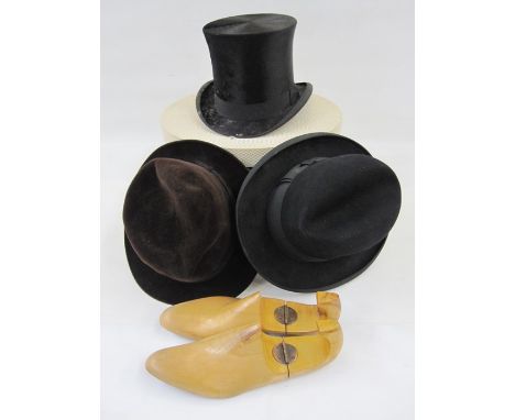 Gentleman's top hat labelled 'City Cork Hat Company, 45a Cheapside' and labelled 3, a Dunn & Co brown velour trilby, a black 