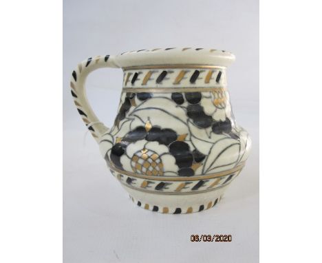 Charlotte Rhead Pottery Mug, Tudor Rose pattern in black and gold with moulded neck and tapering base, approx. 12.5cm high