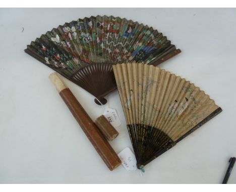 A Chinese painted paper fan, various painted figures to include warriors, Buddhas and serpents, wooden sticks and guards, 29c